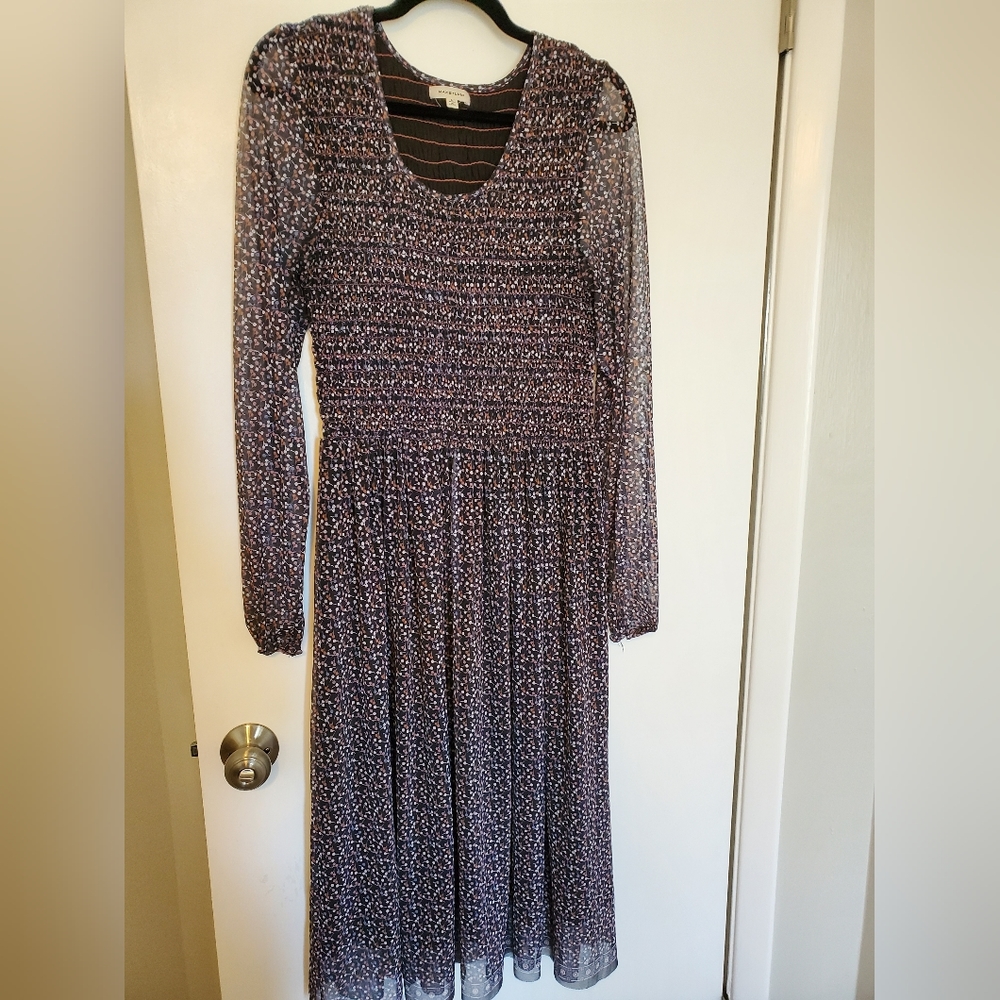 Floral dress with rooched bodice and see thru sleeves